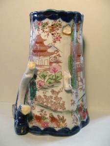 Before treatment, Japanese ceramic jug with handle broken off